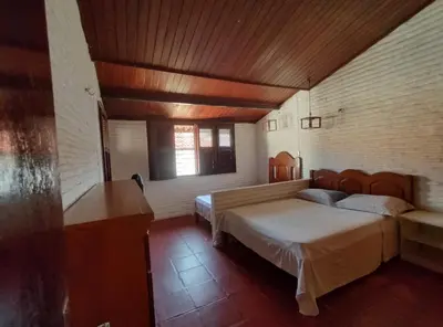 Uma cama ou camas num quarto em Casa no Porto das Dunas Com Vista pro mar
