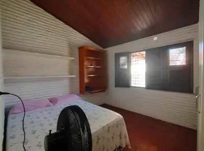Uma cama ou camas num quarto em Casa no Porto das Dunas Com Vista pro mar