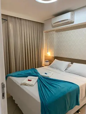 Uma cama ou camas num quarto em Landscape Beira Mar Deluxe Vista Mar
