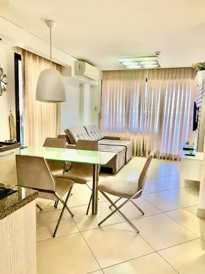Uma área de estar em Landscape Beira Mar Deluxe Vista Mar