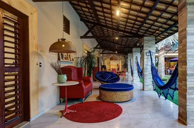Uma área de estar em Casa Oásis com Sauna, Hidro e Piscina by Carpediem