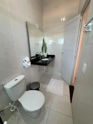 Uma casa de banho em Pousada dos Corais