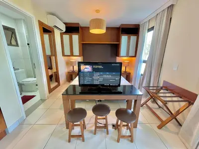 Uma televisão e/ou sistema de entretenimento em Resort VG SUN por Be My Guest!