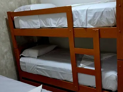 Uma cama ou camas num quarto em BEACH PARK PALM - COBERTURA Luxo