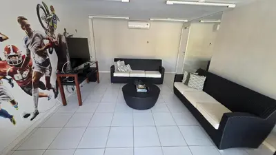 Uma área de estar em BEACH PARK PALM - COBERTURA Luxo