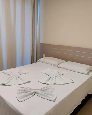 Uma cama ou camas num quarto em Apartamento em Canoa Quebrada-Vilas na Praia Residence apto 03
