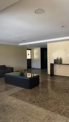 Uma área de estar em Flat Beira Mar Fortaleza