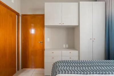 Uma cama ou camas num quarto em ECO FLECHEIRAS RESIDENCE