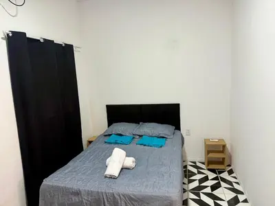 Uma cama ou camas num quarto em Casa no centro na Praia do Preá/CE