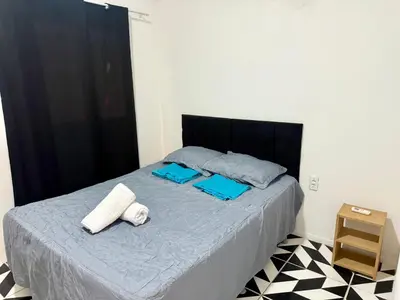 Uma cama ou camas num quarto em Casa no centro na Praia do Preá/CE