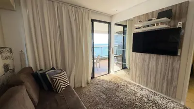 Uma televisão e/ou sistema de entretenimento em Landscape Beira Mar