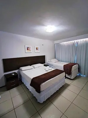 Uma cama ou camas num quarto em Flat Frente Mar - Beira Mar Fortaleza