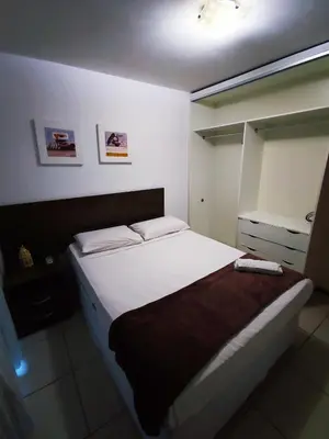 Uma cama ou camas num quarto em Flat Frente Mar - Beira Mar Fortaleza