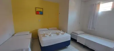 Uma cama ou camas num quarto em Pousada Ah Mar