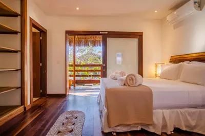 Uma cama ou camas num quarto em Villa Messina Jeri
