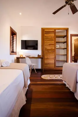 Uma cama ou camas num quarto em Villa Messina Jeri