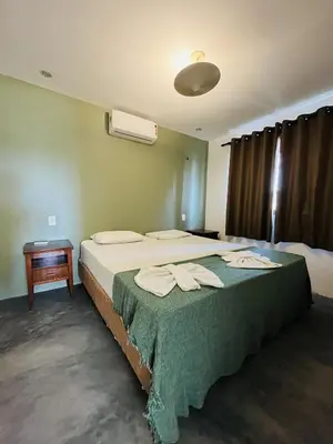 Uma cama ou camas num quarto em Aldeias Guajiru Apart