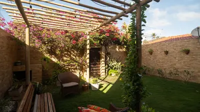 Um jardim no exterior de Casa do Bougainvillea Mundaú-Trairi-Ce