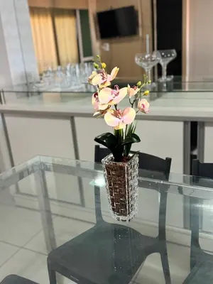 Uma televisão e/ou sistema de entretenimento em Apartamento Beira Mar Fortaleza Beach Class
