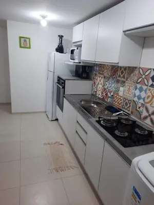 A cozinha ou kitchenette de Cumbuco Residencial Dunas Beach apt.203
