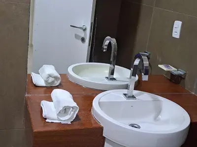 Uma casa de banho em Vilas Na Praia Residence Condomínio