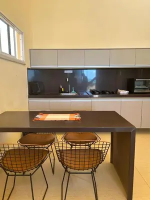 A cozinha ou kitchenette de Vilas Na Praia Residence Condomínio