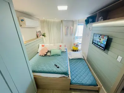 Uma cama ou camas num quarto em Flat Luxuoso Alto Padrao Frente Mar com 2 suites no Iate Plaza