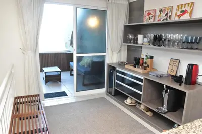 A cozinha ou kitchenette de TERRAMARIS DUPLEX LUXO - FRENTE MAR
