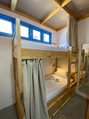 Uma cama ou camas num quarto em MAKTUB PREA HOSTEL