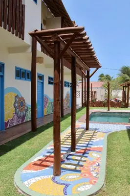 Um jardim no exterior de MAKTUB PREA HOSTEL