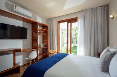 Uma cama ou camas num quarto em Aiolos Hotel & Discoveries