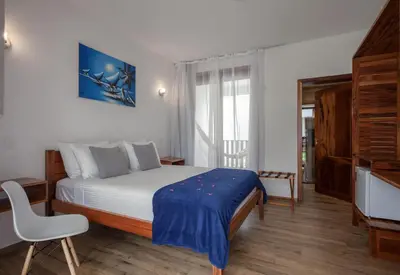 Uma cama ou camas num quarto em Aiolos Hotel & Discoveries