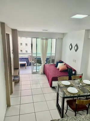 Uma cama ou camas num quarto em Beach Class Praia de Iracema