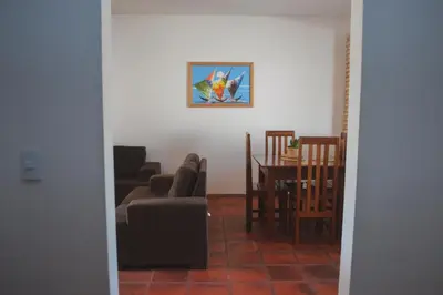 Uma área de estar em Apartamentos da Jangada