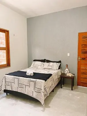 Uma cama ou camas num quarto em Casa de praia em vila preá