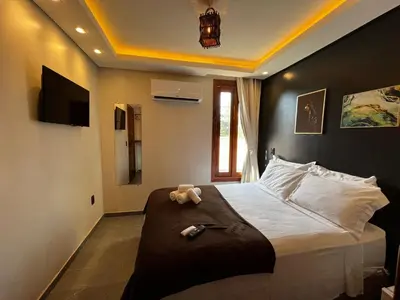 Uma cama ou camas num quarto em Milos Hotel Icaraizinho