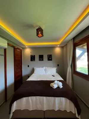 Uma cama ou camas num quarto em Milos Hotel Icaraizinho