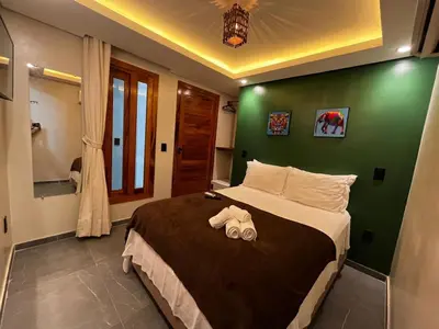 Uma cama ou camas num quarto em Milos Hotel Icaraizinho