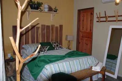 Uma cama ou camas num quarto em Sítio Vale da Serra