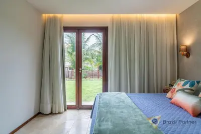Uma cama ou camas num quarto em Apartamento 3 Suítes - Completo - Praia da Taíba