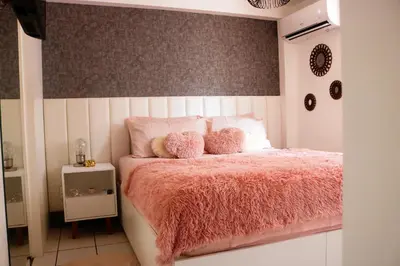 Uma cama ou camas num quarto em Apartamento com Varanda vista mar