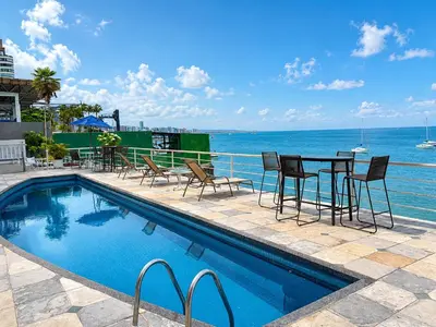 A piscina em ou perto de Hosts BR - Cobertura duplex frente mar