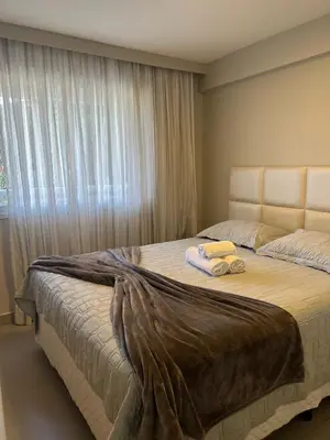Uma cama ou camas num quarto em Apartamento prox a Beira Mar