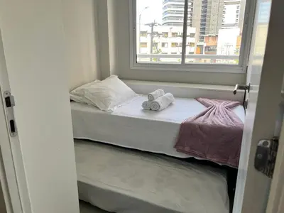 Uma cama ou camas num quarto em Apartamento prox a Beira Mar