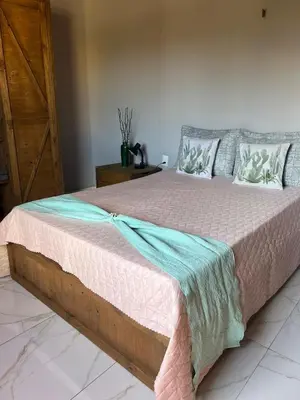 Uma cama ou camas num quarto em Casa Ferreira Cumbuco
