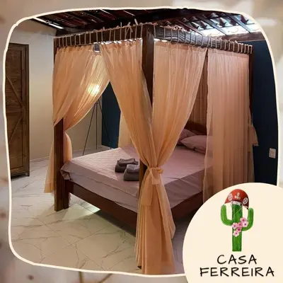 Uma cama ou camas num quarto em Casa Ferreira Cumbuco