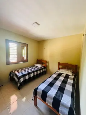 Uma cama ou camas num quarto em Chalé Suíço