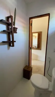 Uma casa de banho em Suíte Paradise