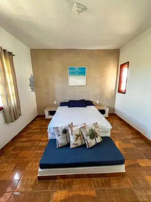 Uma cama ou camas num quarto em Casa Egípcia em Morro branco - na quadra da praia