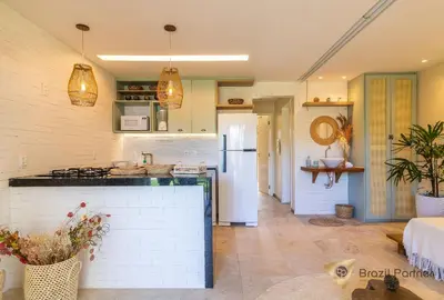 A cozinha ou kitchenette de Taíba Beach Resort - Apartamento Encantador!